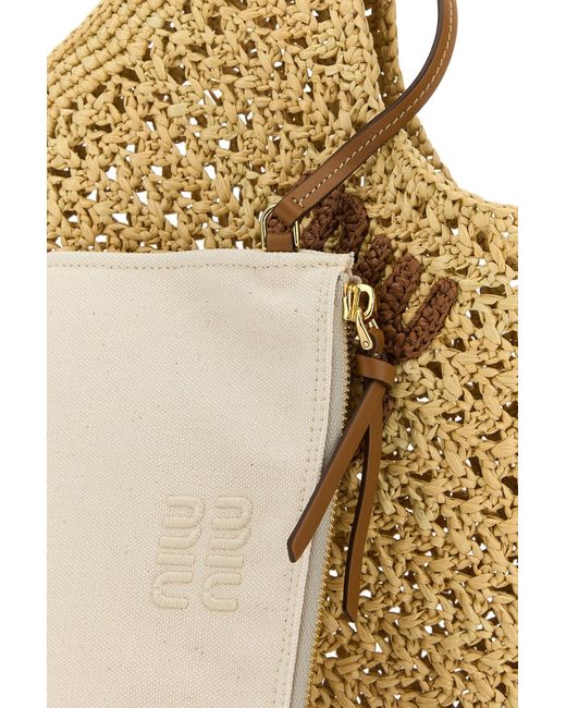 Borsa shopping in rafia di Miu Miu in Natural