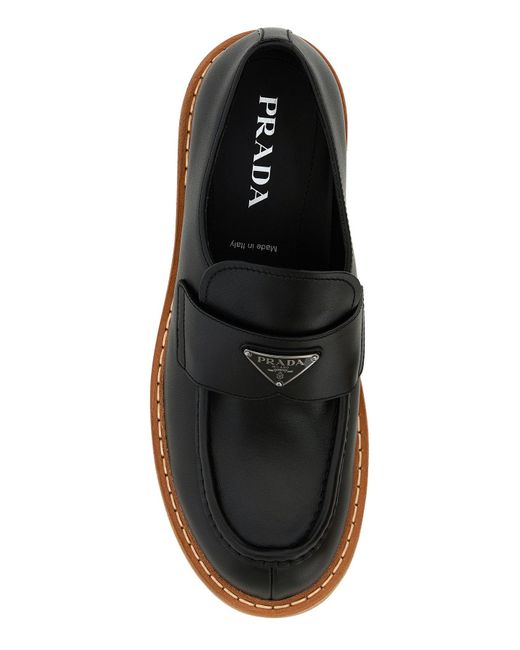 Mocassini in pelle nera di Prada in White da Uomo