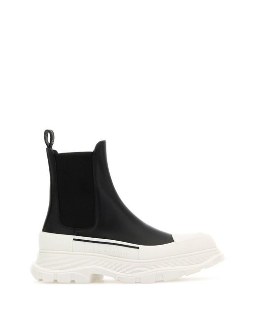 Stivaletti Tread Slick in nappa nera di Alexander McQueen in Black