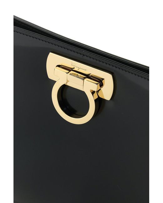 Clutch in pelle nera di Ferragamo in Black