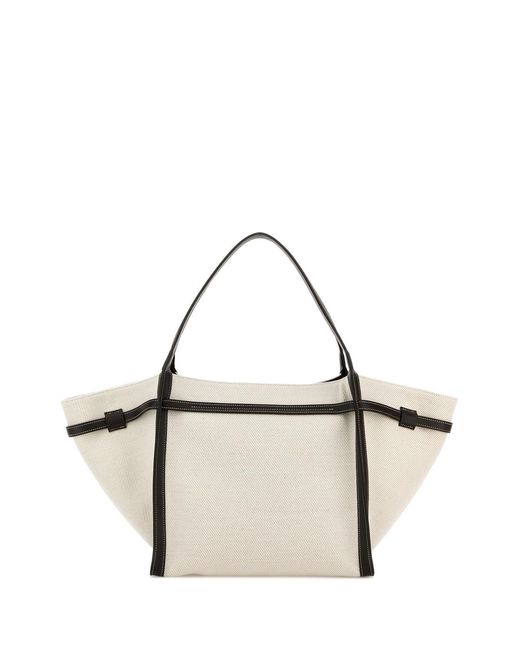 Tod's Metallic White Canvas Medium Shopping Bag