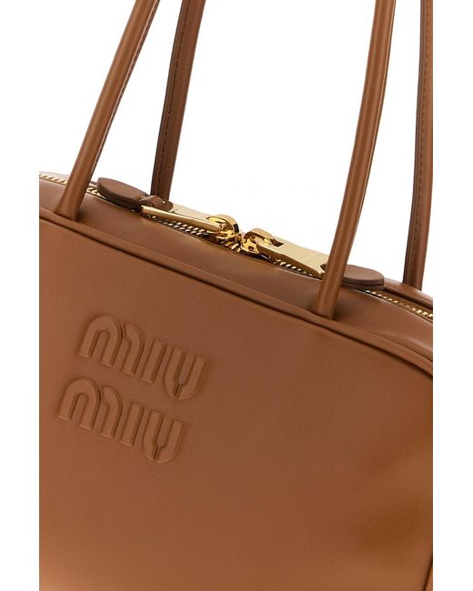 Borsa a spalla in pelle caramello di Miu Miu in Brown