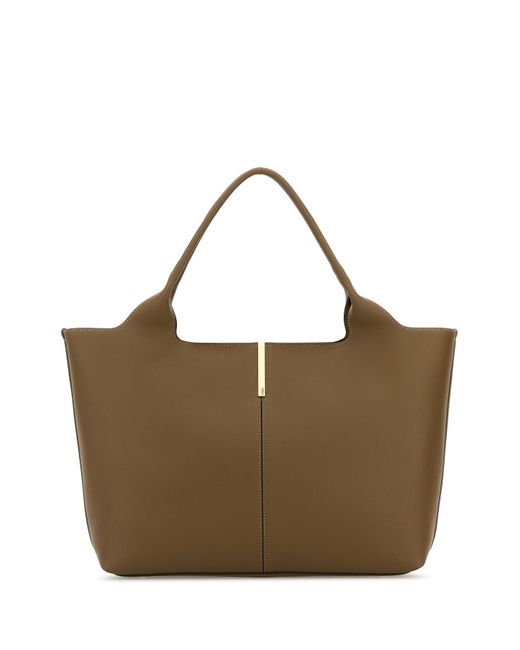 Esterno: 100% Vitello Fodera: 100% Pelle scamosciata Finitura: Metallo dorato di Tod's in Brown