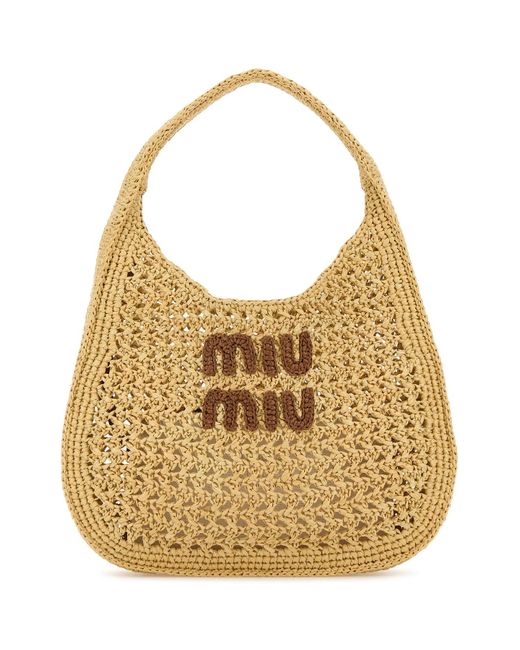Borsa shopping in rafia di Miu Miu in Natural