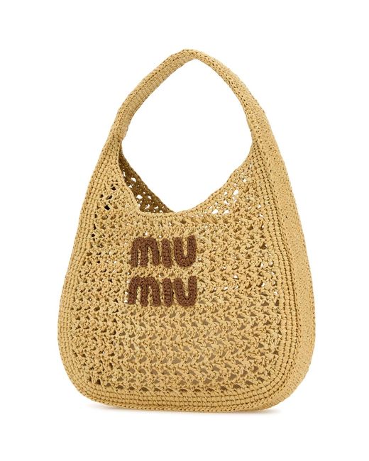 Borsa shopping in rafia di Miu Miu in Natural