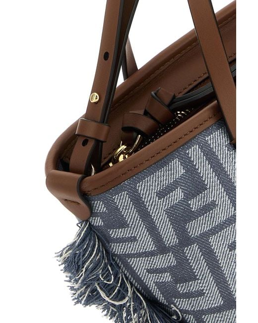 Borsa a mano Roll mini in denim ricamato di Fendi in Gray