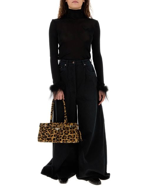 PANTALONI di Prada in Black