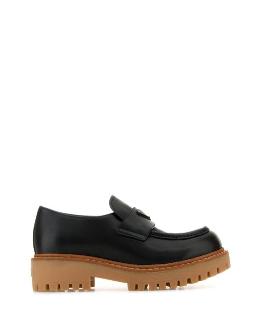 Mocassini in pelle nera di Prada in White da Uomo