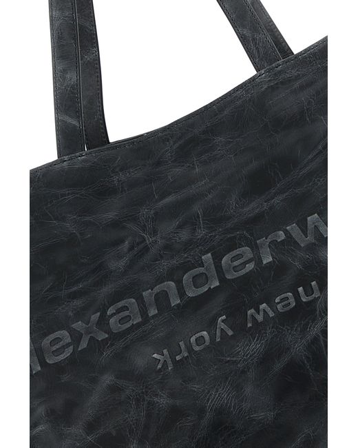 Borsa shopping Punch piccola in pelle grigio scuro di Alexander Wang in Black