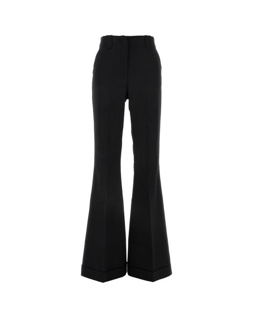 Pantalone a zampa Sofia in twill stretch nero di ANDAMANE in Black