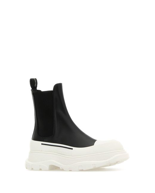 Stivaletti Tread Slick in nappa nera di Alexander McQueen in Black