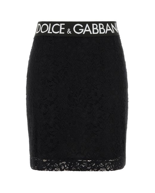 Minigonna in pizzo stretch nero di Dolce & Gabbana in Black