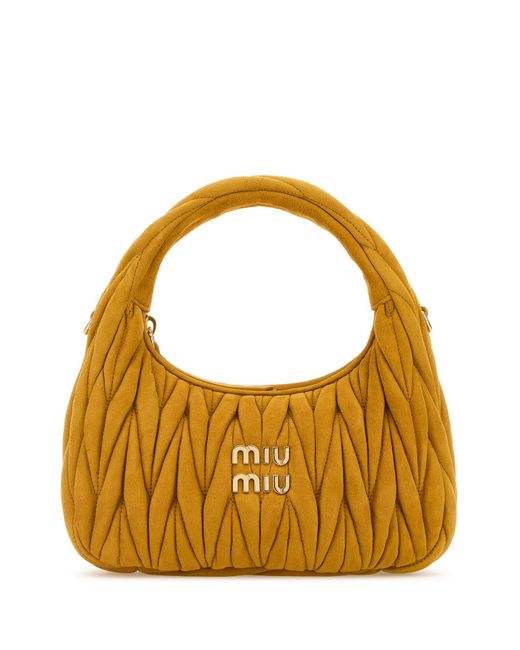 Borsa a mano in pelle scamosciata arancione di Miu Miu in Metallic
