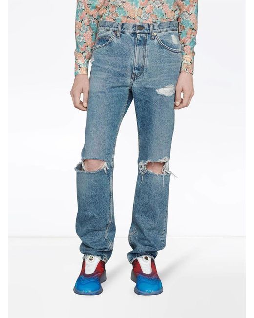 ripped gucci jeans