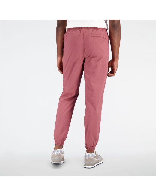 New Balance Red Sport Essentials Premium Woven Pants for men