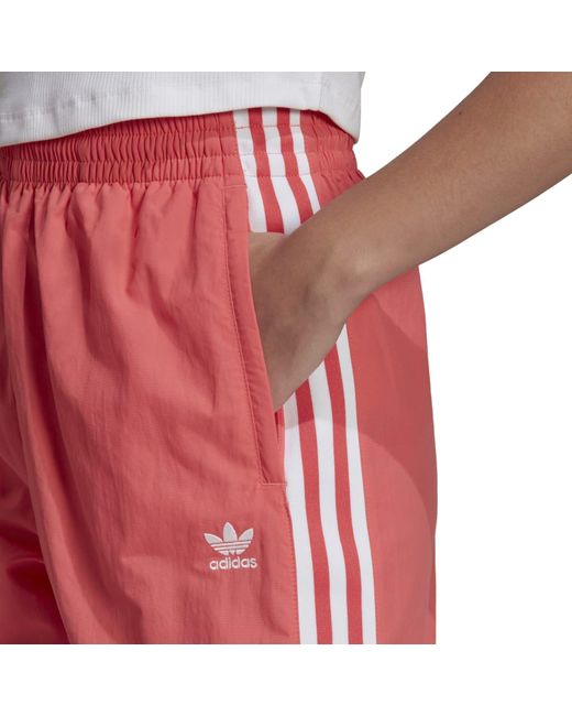 Adidas originals womens woven lock up track pant scarlet red deals