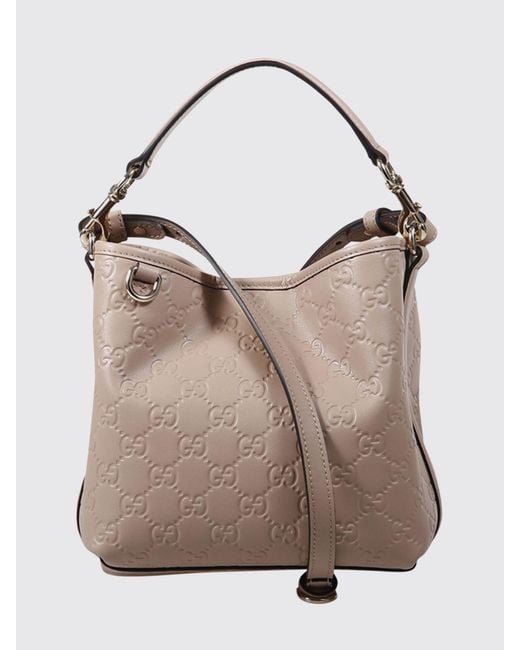 Gucci Natural Gg Emblem Leather Bucket Bag With Embossed Gg Monogram