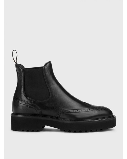 Doucal's Black Leather Ankle Boots With Brogue Motif