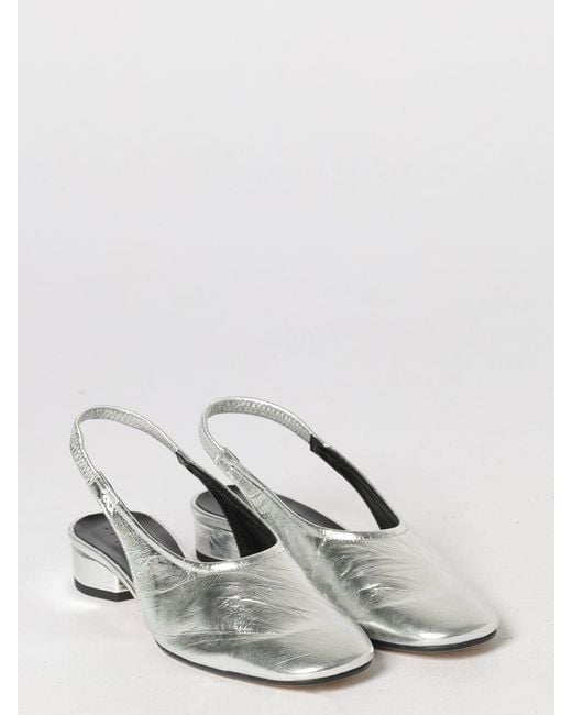 Aeyde White Laminated Leather Slingback Pumps