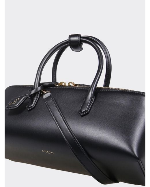 Alaïa Black Small Leather Handbag With Double Tubular Handle And Logo Charm