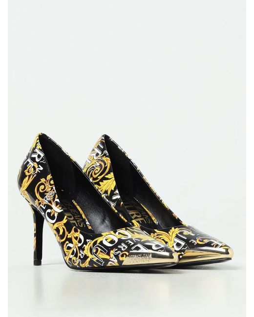 Zapatos de tacón Versace de color Metallic
