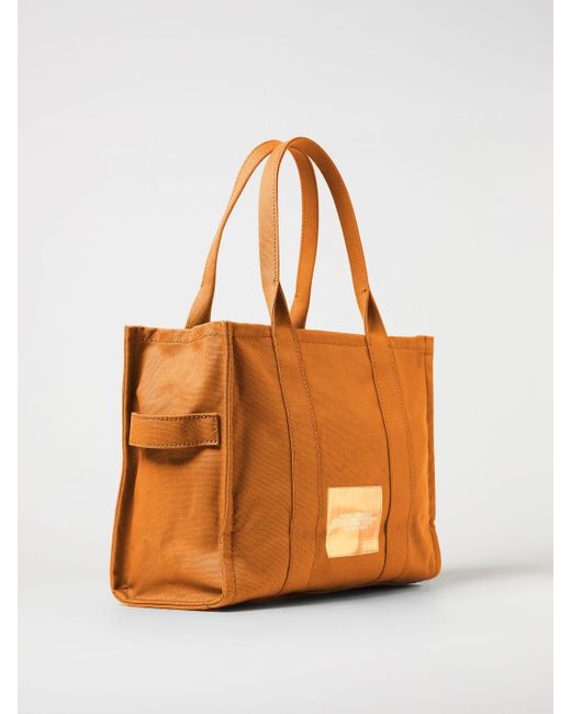 Borsa The Large Tote Bag in canvas con logo jacquard di Marc Jacobs in Orange