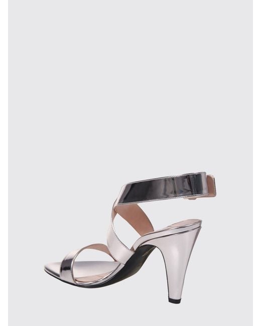 Alaïa White Patent Leather Sandals With A High Cone Heel And An Ankle Strap
