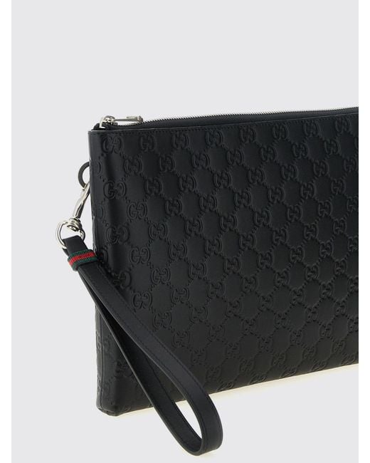 Gucci Black Gg Emblem Embossed Leather Pouch for men