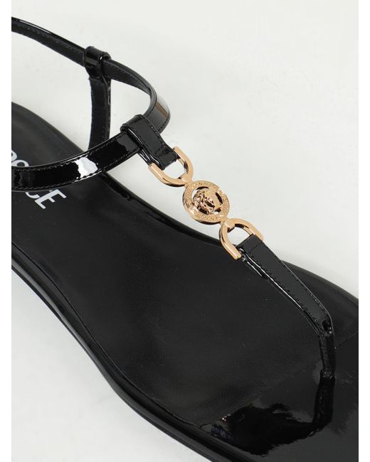 Sandalo in vernice di Versace in Black