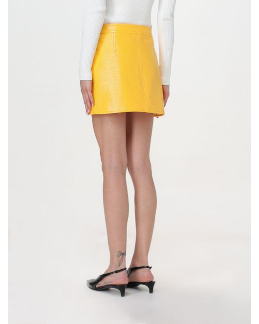 Gonna in vernice con logo di Courreges in Yellow