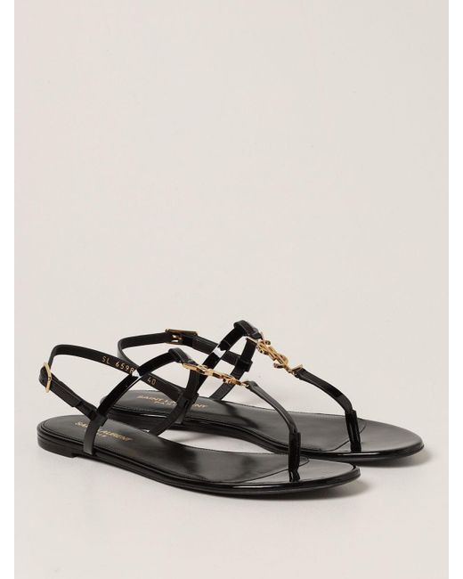 Sandalias planas Saint Laurent de color Negro | Lyst