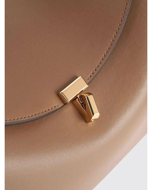 Totême Natural T-Lock Leather Handbag With A Flared Shape And Turn-Lock Closure