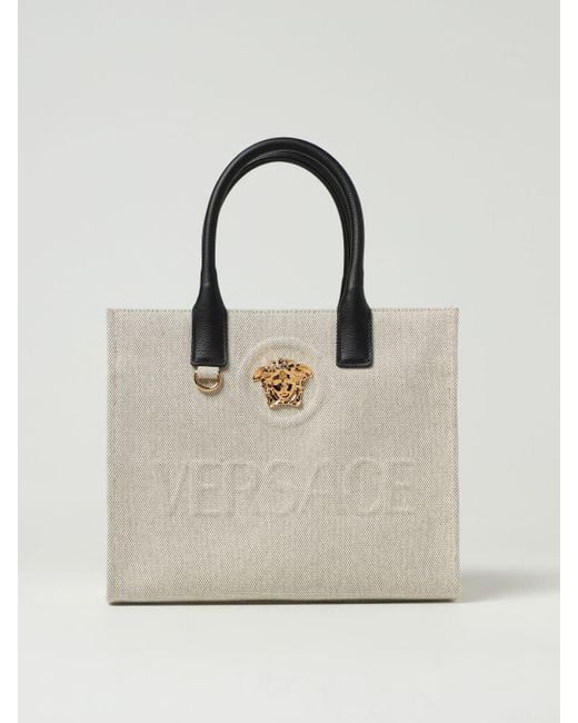 Versace Tote Bags in Natural | Lyst