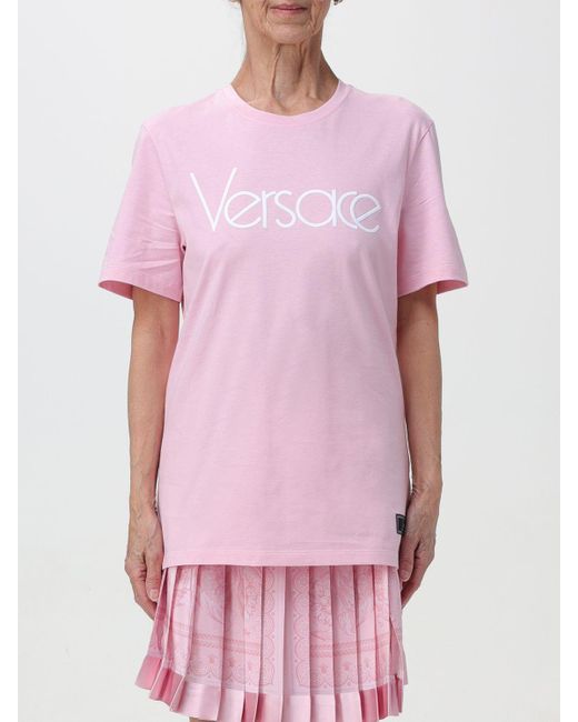 T-shirt in cotone con logo di Versace in Pink