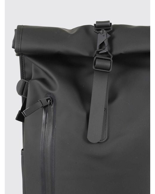 Rains Black Rolltop Rucksack Waterproof Backpack With Carabiner Closure for men