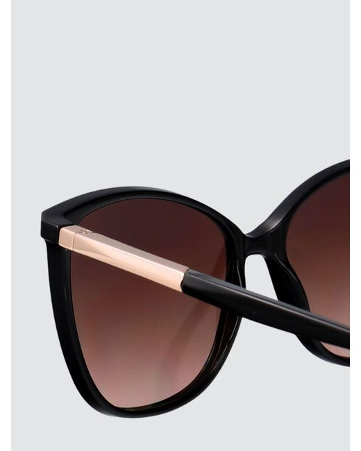 Calvin Klein Black Cat-Eye Acetate Sunglasses With Amber Lenses