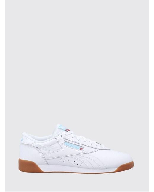 Reebok White Freestyle Low-Top Leather Sneakers With Carved Logo And Terry Interior
