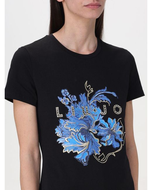 T-shirt in cotone con logo e strass di Liu Jo in Black