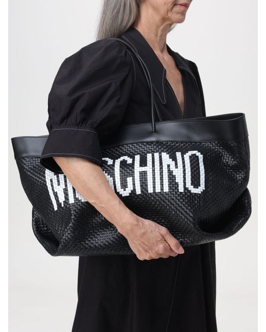 Borsa in pelle intrecciata di Moschino Couture in Black