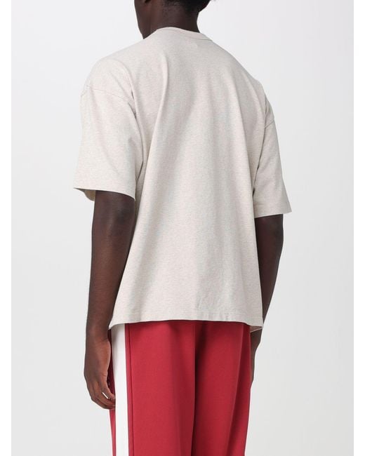 Champion Red Relaxed Fit Cotton T-Shirt With Front Logo And Slogan Print for men