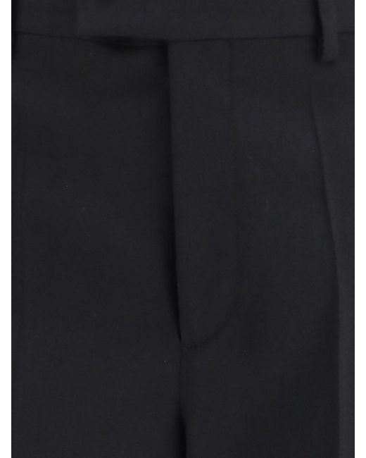 Valentino Garavani Blue Slim Fit Tailored Merino Wool Trousers for men