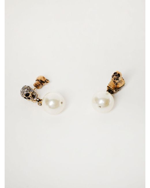 Orecchini Skull di Alexander McQueen in Natural