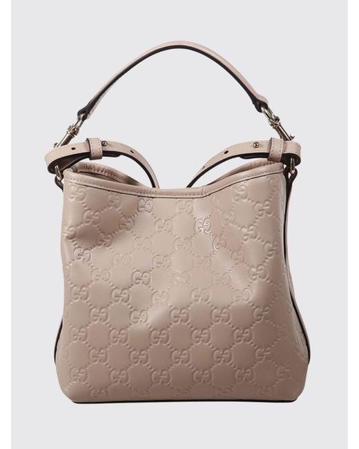 Gucci Natural Gg Emblem Leather Bucket Bag With Embossed Gg Monogram