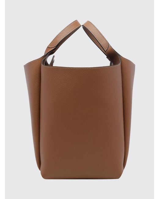Tod's Brown Hammered Leather Bucket Bag With Double Handle And Charm