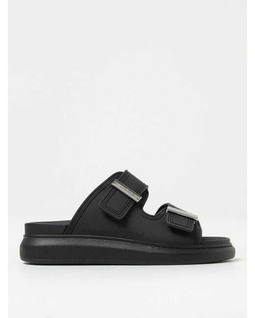 Sandales plates Alexander McQueen en coloris Black
