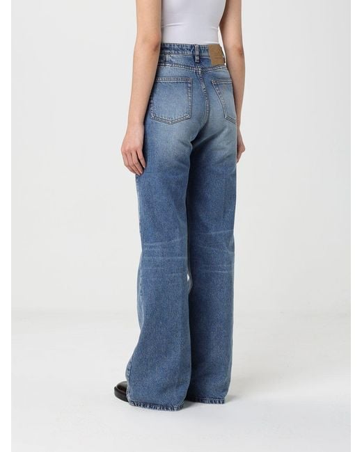 Jeans Flared De Denim De Algodón AMI de color Blue