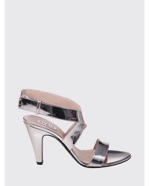 Alaïa White Patent Leather Sandals With A High Cone Heel And An Ankle Strap