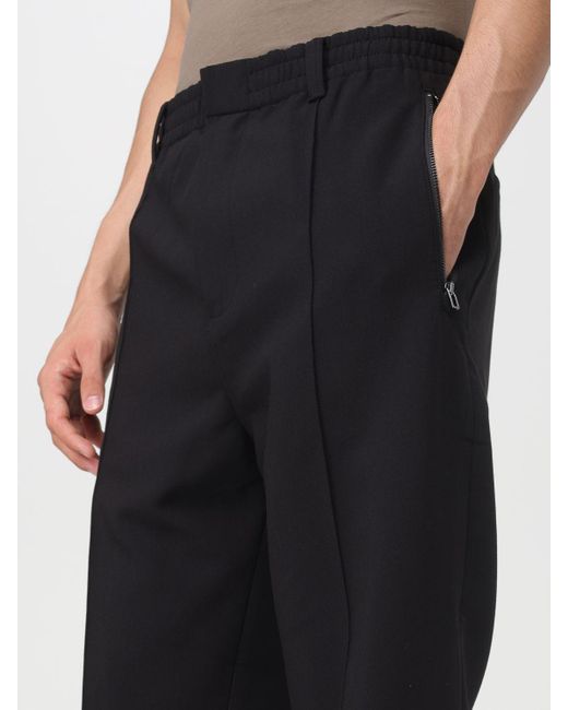 Black trousers with logo Emporio Armani | Ratti Boutique
