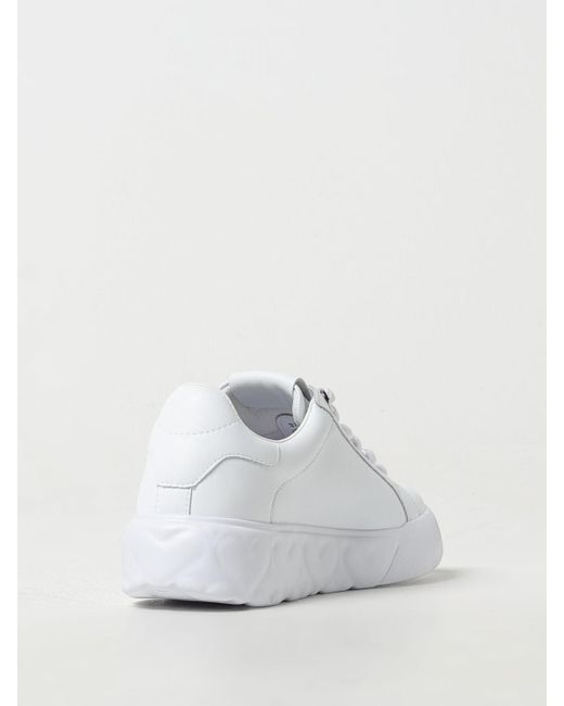 Sneakers in pelle con charm di Love Moschino in White