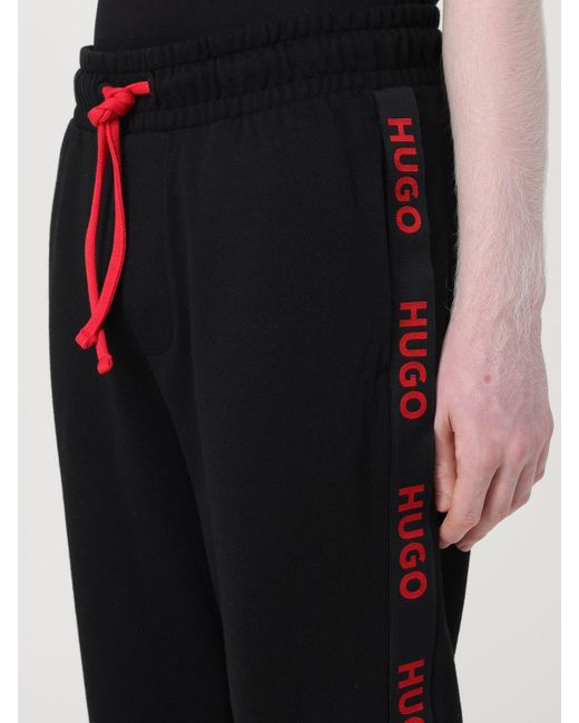 Pantalone in cotone di HUGO in Black da Uomo